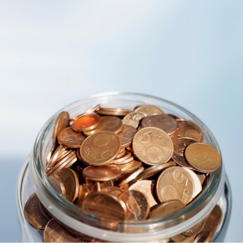 close-up_of_euro_coins_in_jar